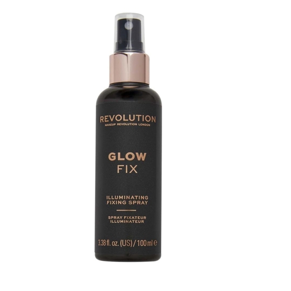 Un flacon noir et or de Make up Revolution Pro Fix Spray fixateur de maquillage illuminant 100ml se tient debout sur un fond blanc. Dakar