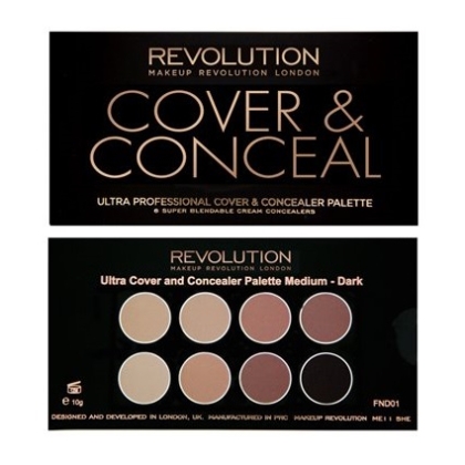 La Palette Correcteur Anti Cernes Ultra Cover and Concealer Medium Dark de MakeUp Revolution se présente sous la forme d'un boîtier noir élégant contenant huit teintes d'anti-cernes crème allant du clair au foncé, présentées à la fois fermées et ouvertes. Dakar
