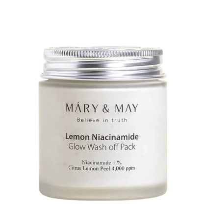 Un pot blanc de Mary and May Masque Purifiant au Niacinamide 125 ml avec un couvercle argenté se trouve à côté du Mary and May Masque à l'Eau de Rose. L'étiquette indique 1 % de niacinamide et 4 000 ppm d'écorce de citron. Dakar
