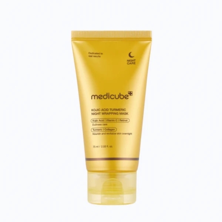 Un tube jaune de Medicube Masque de Nuit Révélateur d'Éclat Acide Kojique et Curcuma 75 ml, avec un étiquetage détaillé et les ingrédients, se tient debout sur un fond blanc. Dakar