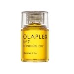 Un flacon transparent de Olaplex N°7 Bonding Oil Huile pour Cheveux 30 ml, rempli d'un liquide jaune et doté d'un bouchon à vis transparent. L'étiquette indique le nom du produit et la taille : 30 ml / Net 1 fl oz. Dakar