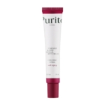 Un tube blanc avec un bouchon rose foncé étiqueté "Purito Crème Anti Taches au Rétinol 0.1% Timeless Bloom", conçu pour le soin du vieillissement avec de l'hortensia et du rétinol, dans un format de 30 ml. Dakar