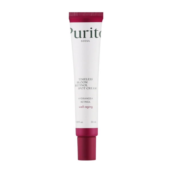 Un tube blanc avec un bouchon rose foncé étiqueté "Purito Crème Anti Taches au Rétinol 0.1% Timeless Bloom", conçu pour le soin du vieillissement avec de l'hortensia et du rétinol, dans un format de 30 ml. Dakar