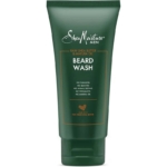 Un tube vert de 177ml de Shea Moisture Beard Wash Nettoyant pour la barbe, contenant du beurre de karité brut et de l'huile de mafura. L'étiquette mentionne l'absence de parabènes, de sulfates, de tests sur les animaux, de phtalates et d'huile minérale. Dakar