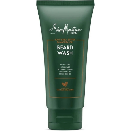 Un tube vert de 177ml de Shea Moisture Beard Wash Nettoyant pour la barbe, contenant du beurre de karité brut et de l'huile de mafura. L'étiquette mentionne l'absence de parabènes, de sulfates, de tests sur les animaux, de phtalates et d'huile minérale. Dakar