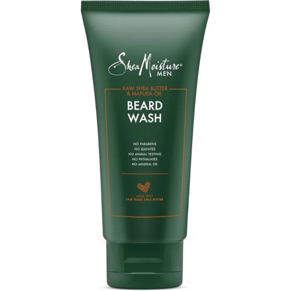 Un tube vert de 177ml de Shea Moisture Beard Wash Nettoyant pour la barbe, contenant du beurre de karité brut et de l'huile de mafura. L'étiquette mentionne l'absence de parabènes, de sulfates, de tests sur les animaux, de phtalates et d'huile minérale. Dakar