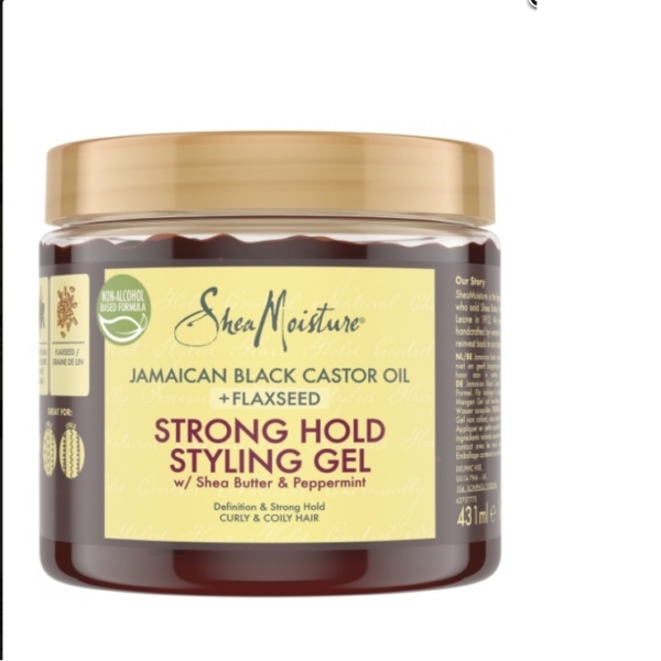 Shea Moisture Huile de Ricin Noir de Jamaïque Gel Coiffant 431 ml est un gel coiffant pour les cheveux bouclés et frisés avec un couvercle brun clair et une étiquette jaune. Dakar