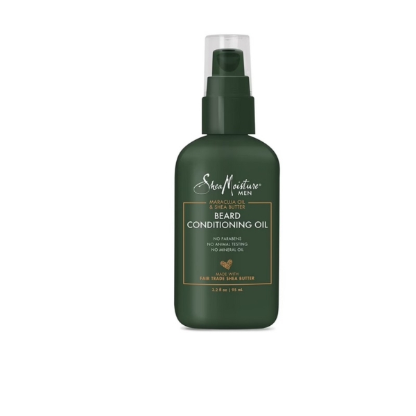 Un flacon vert foncé de 100ml de Shea Moisture Huile Revitalisant pour barbe au maracuja et au beurre de karité avec un distributeur à pompe et un texte doré sur l'étiquette, présenté sur un fond blanc. Dakar