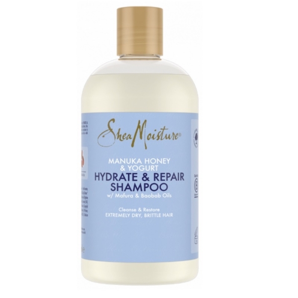 Flacon transparent de 384 ml de Shea Moisture Miel de Manuka et Yaourt Shampoing Hydratant et Réparateur avec un bouchon doré et une étiquette bleu clair, conçu pour les cheveux extrêmement secs et cassants. Dakar