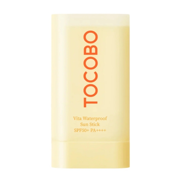 Un Tocobo Stick Solaire Spf50 Vita Waterproof Sun 18g jaune avec un texte orange en gras se trouve à côté de la Tocobo Crème, offrant une routine solaire complète. Dakar