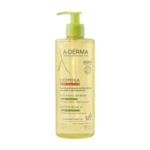 Flacon transparent de 500 ml de A Derma Exomega Control Huile Lavante Émolliente Anti Grattage et Irritations Peau Sèches avec une pompe verte, conçu pour les peaux sèches, atopiques et sujettes à l'eczéma. L'étiquette a des accents verts et orange. Dakar