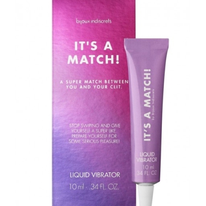 Une boîte violette et un tube étiqueté "Bijoux Indiscrets Baume Clitoridien It's a Match 10 ml" comportent un texte ludique et suggestif pour une expérience amusante. Dakar