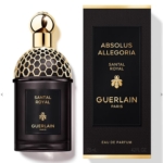Un flacon de Guerlain Absolus Allegoria Rose Amira Eau de parfum Femme 125ml avec des détails en nid d'abeille dorés et un coffret noir et or assorti étiqueté "Absolus Allegoria Rose Amira Guerlain Paris". Dakar