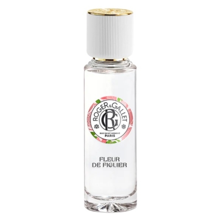 Un flacon en verre transparent de 30ML de Roger et Gallet Fleur de Figuier Eau de parfum se tient debout sur un fond blanc, avec un bouchon strié blanc et une étiquette frontale aux accents floraux. Dakar