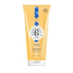 Un tube jaune de 200 ml de Roger et Gallet Vanille Soleil Bienfaisant Gel douche présente un motif floral bleu près du sommet et une étiquette blanche avec le nom et la marque du produit. Dakar