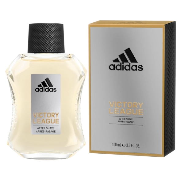 Un flacon de 100 ml d'après-rasage Adidas Après Rasage Victory League avec un bouchon noir et une étiquette argentée, emballé dans une boîte grise avec des accents dorés présentant la marque et les détails du produit. Dakar