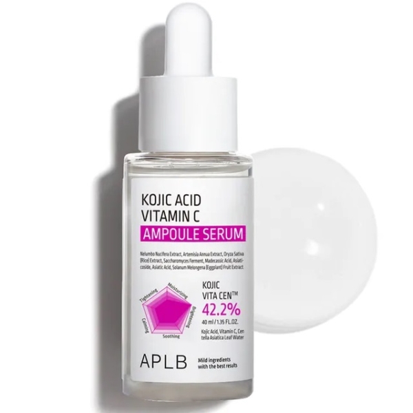 Flacon compte-gouttes d'Aplb Sérum Concentré Illuminatrice à l'Acide Kojique et Vitamine C 40 ml, présentant un motif géométrique rose et des détails sur les ingrédients, avec un bouchon blanc à côté sur fond blanc. Dakar
