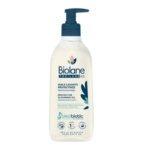 Le flacon pompe transparent de Biolane Topilane Ad Huile Lavante Protectrice 350ml comporte un texte français/anglais bleu et vert, une pompe bleue et une étiquette blanche avec les détails et les logos du produit. Dakar