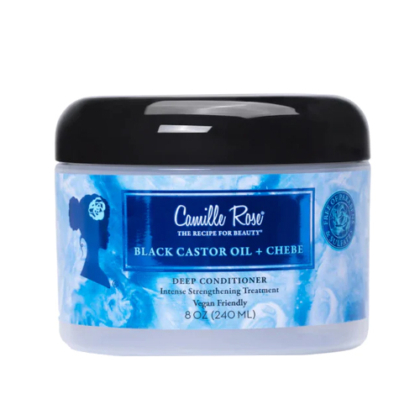 Une boîte de Camille Rose Après Shampoing Traitement Fortifiant Intense Huile de Ricin + Chebe, traitement fortifiant intense, vegan friendly, 240 ml, avec un design bleu et un couvercle noir. Dakar
