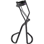 Le Catrice Lash Curler Recourbe Cils avec Peigne Intégré est un recourbe-cils en métal noir avec des poignées rembourrées et une pince rembourrée, présenté sur fond blanc. Dakar