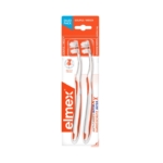 Deux brosses à dents Elmex Anti Caries InterX Brosse à Dents Souple Duo Pack avec des poils souples en blanc et orange, emballées dans du plastique et du carton, se tiennent debout dans leur emballage "Duo Pack". Dakar