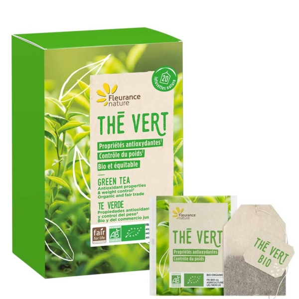 Une boîte verte de thé vert biologique Fleurance Nature Thé Vert Bio Équitable Contrôle Poids 20 Infusettes, présentée avec un sachet de thé et un paquet scellé. L'emballage présente des feuilles vertes et des informations multilingues en français, anglais et espagnol. Dakar