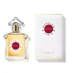 Un flacon de parfum Guerlain Samsara se trouve à côté de son emballage en boîte blanche, tous deux portant une étiquette circulaire rouge et blanche avec "Guerlain Paris". Le flacon contient un liquide ambré clair. Dakar