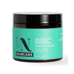 Un pot de In HairCare Gelée Detox Gommage Cuir Chevelu 200ml avec une étiquette verte et noire sur fond blanc. Dakar