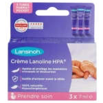 Une boîte violette et bleue de Lansinoh Crème Apaisante Lanoline HPA Pour Mamelons 3x7 ml avec trois petits tubes. L'emballage, en français, met en avant sa formule 100% naturelle pour apaiser et protéger les mamelons crevassés. Dakar