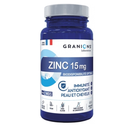 Flacon bleu du complément alimentaire Granions Zinc 15 mg, étiqueté en français pour l'immunité, le soutien antioxydant et les bienfaits pour la peau et les cheveux ; des icônes indiquent qu'il est végétalien, sans gluten, sans colorant ni conservateur. Dakar