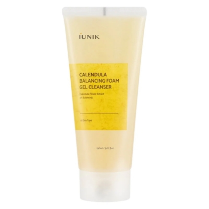 Un tube de 150ml de Iunik Gel nettoyant Moussant Equilibrant au Calendula, adapté à tous les types de peau, avec une étiquette jaune et un bouchon transparent. Dakar