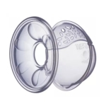 Coquilles mammaires en plastique transparent avec un trou central et un design ventilé, utilisées par les mères allaitantes pour recueillir le lait et protéger les mamelons à l'intérieur d'un soutien-gorge. Dakar