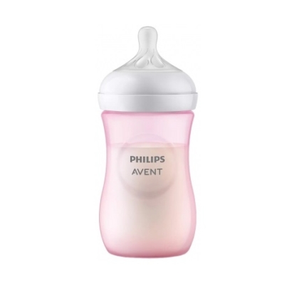 Un biberon rose Philips Avent rempli de lait, avec une tétine blanche et un couvercle transparent. Le biberon se tient debout sur un fond blanc uni. Dakar