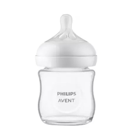 Un biberon transparent Philips Avent avec un bouchon blanc et une tétine en silicone, sur fond blanc. La marque "PHILIPS AVENT" est imprimée sur le devant du biberon. Dakar