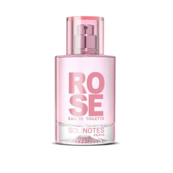 Un flacon de parfum rose étiqueté "ROSE Eau de Toilette" se détache sur un fond blanc, évoquant la fraîcheur et l'élégance - tout comme Solinotes Eau De Parfum A La Rose pour femme 50 ml, avec son bouchon rose assorti et la marque "Solinotes Paris". Dakar