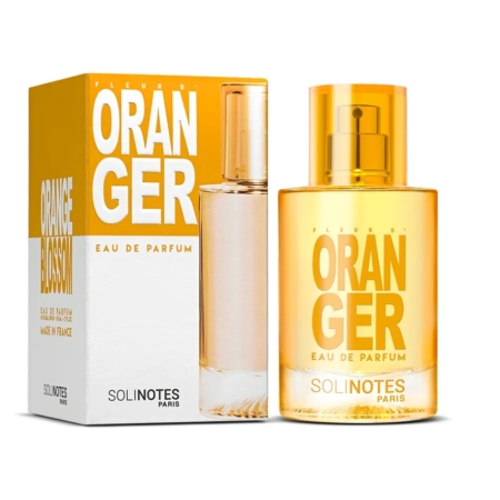 Un flacon de Solinotes Eau De Parfum Fleur D'oranger 50 ml pour Femme se trouve à côté de sa boîte orange et blanche, toutes deux avec un texte en gras et un design moderne. Le flacon transparent est muni d'un bouchon orange. Dakar