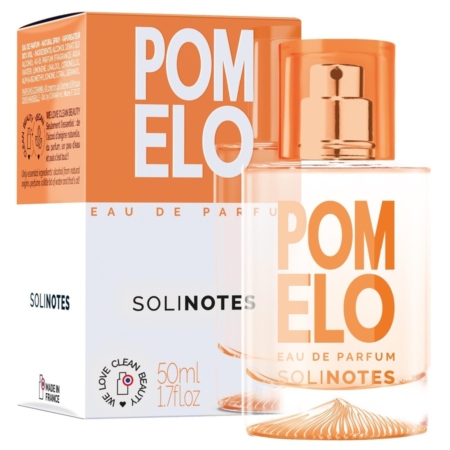 Un flacon et un coffret de Solinotes Eau De Parfum Pomelo 50 ml pour Femme. L'emballage blanc et orange affiche "POMELO" en gras, avec les détails ci-dessous. Le flacon transparent contient 1.7 fl oz de ce parfum vibrant. Dakar