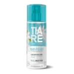 Une bouteille de brume pour le corps et les cheveux Solinotes Tiare Flower avec un bouchon et une étiquette turquoise, avec des illustrations de fleurs blanches et un texte décrivant le produit comme rafraîchissant, hydratant et sans alcool. Dakar