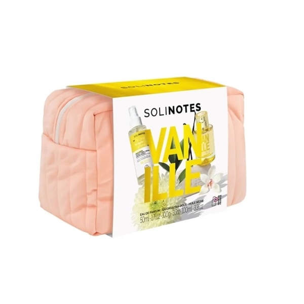 Une trousse de toilette matelassée de couleur pêche contenant un coffret de parfum Solinotes Vanilla, composé d'un flacon de parfum et d'un spray, dont l'emballage est orné de motifs floraux jaunes et blancs. Dakar