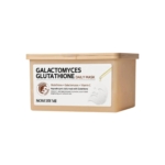 Une boîte rectangulaire beige étiquetée "Some By Mi Yuja Masque Visage Galactomyces Glutathione 30 pièces", avec des informations sur le produit, un compte-gouttes en or et une image de masque facial - similaire au style du Some By Mi Yuja Masque Quotidien Anti Imperfections. Dakar