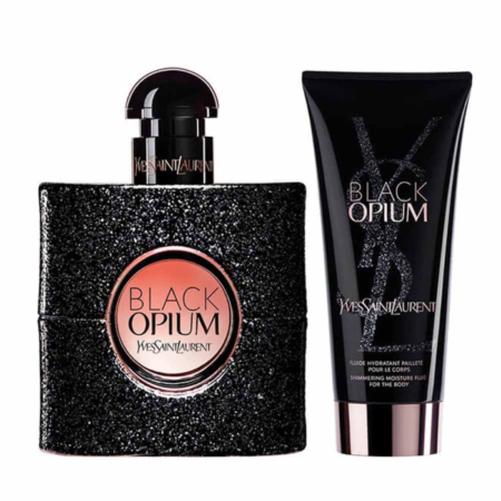Un flacon de parfum Black Opium d'Yves Saint Laurent avec un fini noir pailleté et un tube assorti de fluide hydratant scintillant, tous deux étiquetés avec les logos Black Opium et YSL. Dakar