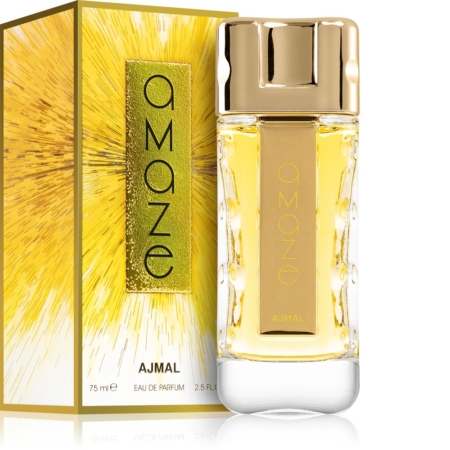 Ajmal Amaze Eau de Parfum pour Femme 75ml, doté d'un bouchon doré, se trouve à côté de sa boîte jaune et dorée avec un motif d'éclatement radieux et une étiquette verticale "amaze". Le flacon contient 75 ml de parfum. Dakar