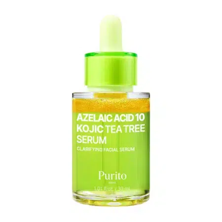 Un flacon compte-gouttes vert étiqueté "AZELAIC ACID 10 KOJIC TEA TREE SERUM CLARIFYING FACIAL SERUM" de Purito, contenant un liquide jaune. Le bouchon compte-gouttes est vert avec un bulbe jaunâtre. Le flacon contient 30 ml. Dakar