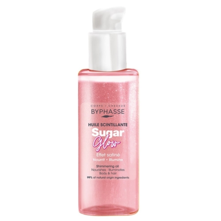 Un flacon rose de Byphasse Sugar Glow Huile Scintillante Corps et Cheveux 100 ml avec une pompe blanche, avec une étiquette qui souligne ses effets nourrissants et illuminants pour le corps et les cheveux et 99% d'ingrédients d'origine naturelle. Dakar