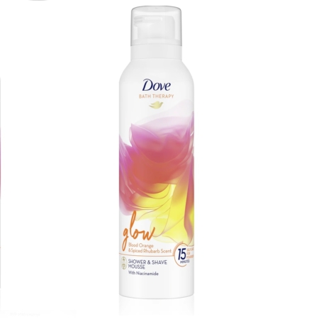 Dove Bath Therapy Glow Mousse de Douche Blood Orange Rhubarb 200 ml présente un motif abstrait orange, rose et jaune, est étiqueté "glow", contient du niacinamide et a un parfum d'orange sanguine et de rhubarbe épicée. Dakar