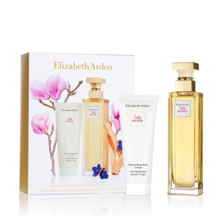 Coffret Elizabeth Arden 5th Avenue comprenant un présentoir, un grand flacon de parfum avec un bouchon doré et un tube de lotion hydratante pour le corps, avec des fleurs de magnolia rose sur l'emballage. Dakar