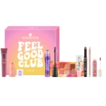 L'Ensemble de Maquillage Make Up Feel Good Club d'Essence comprend un mascara, un rouge à lèvres, un gloss, un crayon à lèvres, un blush, une palette et une crème pour le visage, disposés devant une boîte rose et orange "Feel Good Club". Dakar