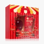 Un coffret cadeau rouge et jaune sur le thème du cirque contenant un flacon de parfum BOUM Vanille & Sa Pomme d'Amour et un lait corporel assorti de Jeanne Arthes. L'emballage est orné d'étoiles et de rayures de carnaval. Dakar