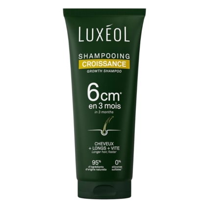Un tube vert de shampooing Luxéol Croissance, labellisé pour favoriser jusqu'à 6 cm de croissance des cheveux en 3 mois. L'emballage met en avant 95% d'ingrédients d'origine naturelle et 0% de silicone, avec un texte en français et en anglais. Dakar