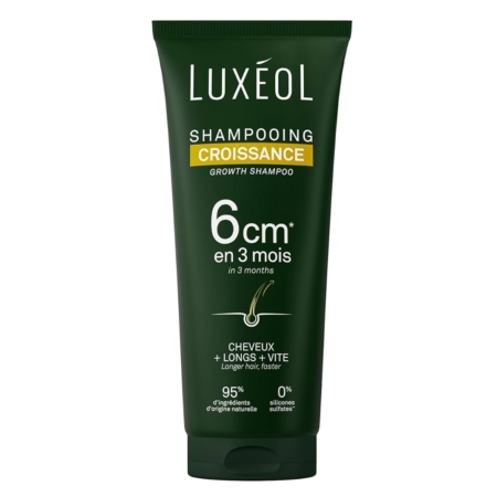 Un tube vert de shampooing Luxéol Croissance, labellisé pour favoriser jusqu'à 6 cm de croissance des cheveux en 3 mois. L'emballage met en avant 95% d'ingrédients d'origine naturelle et 0% de silicone, avec un texte en français et en anglais. Dakar